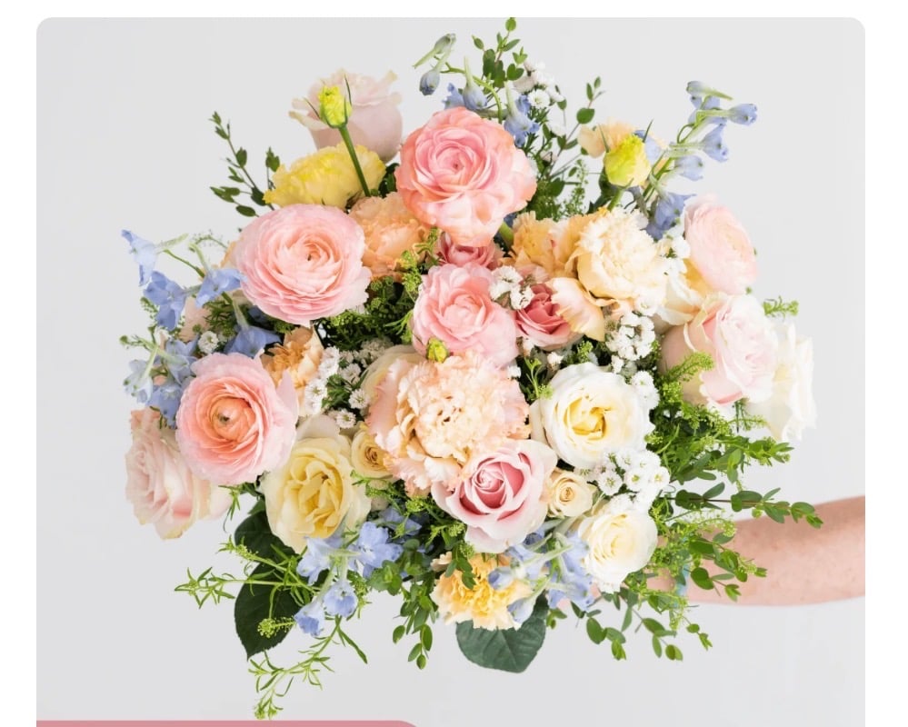 Romantic bridal bouquet with roses and peonies